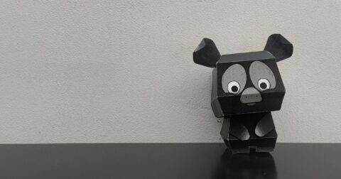 chien Hubert en papier en relief